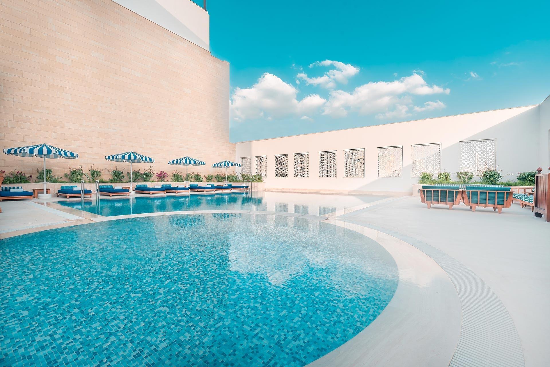 Al Najada Doha Hotel By Tivoli מראה חיצוני תמונה The pool at the hotel